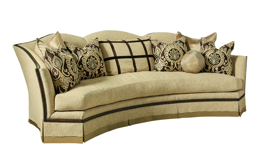Avery Sofa shown with:Boxed bench seatDeep skirt with built-in sides and backContrast 2&frac12;&rdquo; band at bottom of skirtHavana finishAntique Brass nailhead frame trim