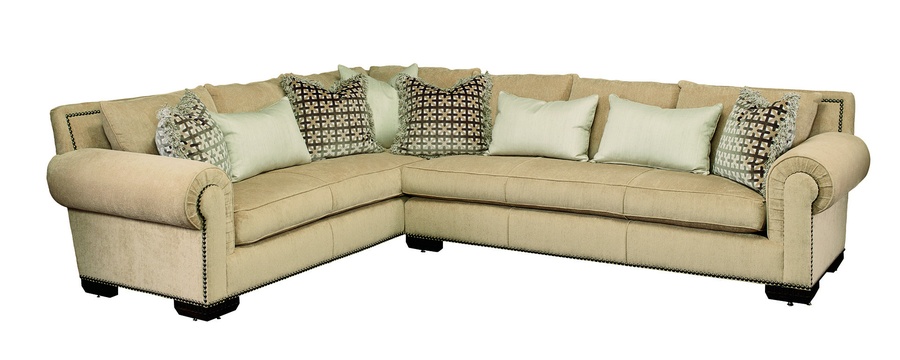 Bentley Sectional shown with:BY53L and BY73LBoxed bench seatTrack&nbsp;ArmBuilt-to-the-floor base with Wood LegsLatte&nbsp;finishGunmetal&nbsp;nailhead frame trim
