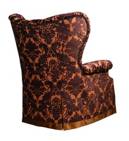 Chandler Chair shown with:Tight&nbsp;seatButton tufted backWaterfall skirt with dressmaker back anddecorative button detailContrast fabric band at bottom of skirtBronze Star&nbsp;nailhead frame trim