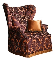 Chandler Chair shown with:Tight&nbsp;seatButton tufted backWaterfall skirt with dressmaker back anddecorative button detailContrast fabric band at bottom of skirtBronze Star&nbsp;nailhead frame trim
