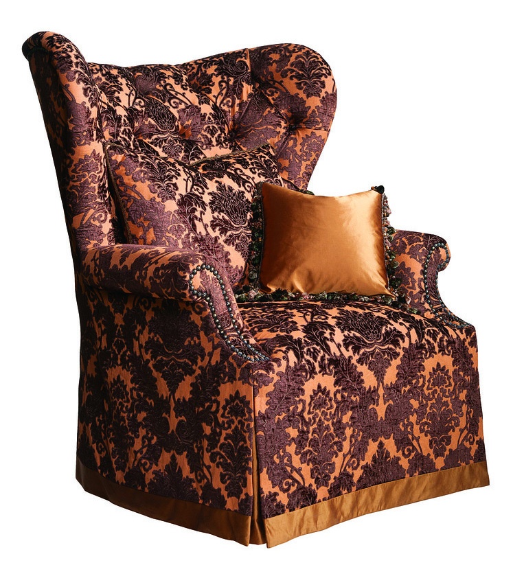 Chandler Chair shown with:Tight&nbsp;seatButton tufted backWaterfall skirt with dressmaker back anddecorative button detailContrast fabric band at bottom of skirtBronze Star&nbsp;nailhead frame trim