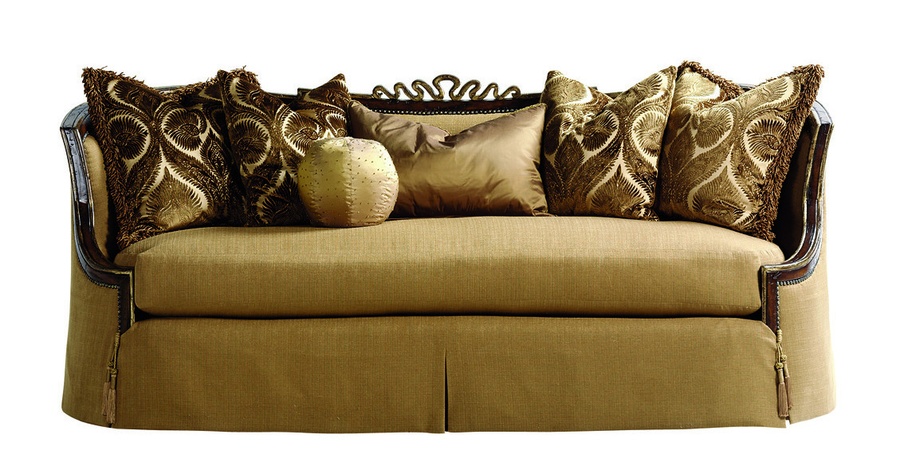 Chantelle&nbsp;Sofa shown with: Boxed bench seatWaterfall&nbsp;skirt with built-in sides, back, and button detailAccessory tassel tiesOld World Hazelnut finishAged Gold Leaf finish trimBronze Star nailhead frame trim