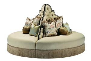 Oasis Round&nbsp;Sofa shown with:Tight seatButton tufted backBullionDecorative&nbsp;tape band over bullionSumatra finish with Specialty&nbsp;Leaf finish trimSilver Star nailhead frame trim
Available in a selection of finishes and finish trims