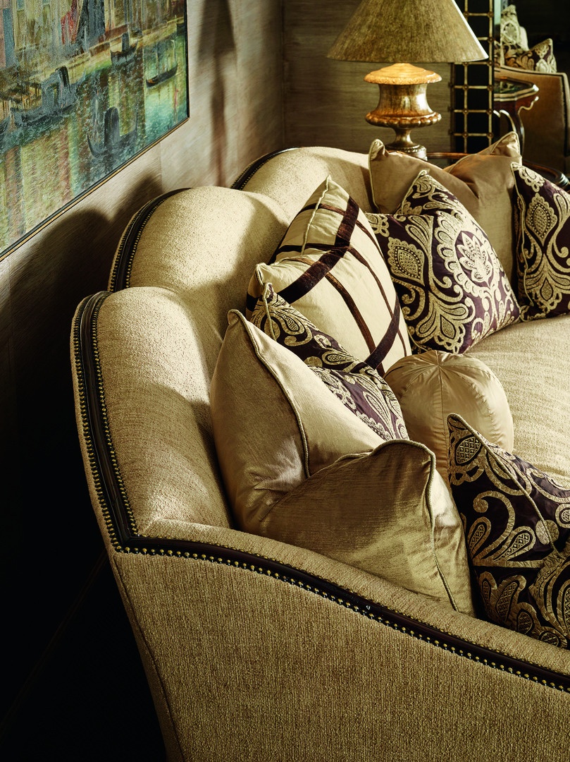 Avery Sofa shown with:Boxed bench seatDeep skirt with built-in sides and backContrast 2&frac12;&rdquo; band at bottom of skirtHavana finishAntique Brass nailhead frame trim