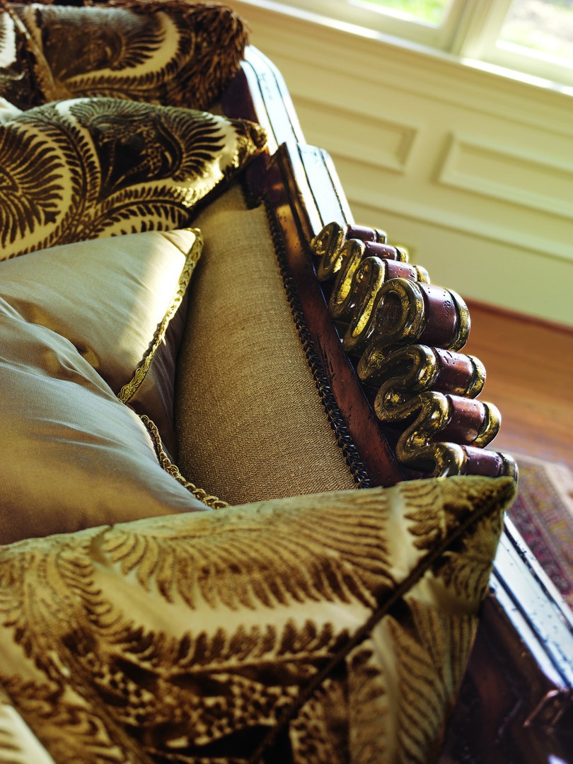 Chantelle&nbsp;Sofa shown with: Boxed bench seatWaterfall&nbsp;skirt with built-in sides, back, and button detailAccessory tassel tiesOld World Hazelnut finishAged Gold Leaf finish trimBronze Star nailhead frame trim