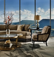 Nolan&nbsp;Chair&nbsp;shown with:Boxed seat cushionBombay&nbsp;finishGunmetal&nbsp;nailhead frame trim