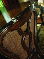 Villa Argenta&nbsp;Counter Stool&nbsp;shown with:Tight seat and backSignature&nbsp;finishAged Gold Leaf finish trimBronze Star&nbsp;nailhead frame trimAntique Brass footrest