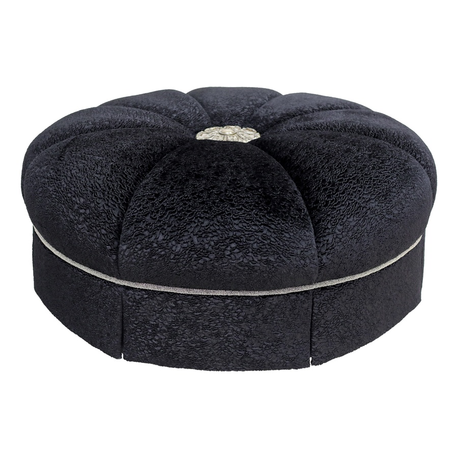 Garbo Ottoman shown with:Tight seat with center button in choice of select finishesBox pleated skirtAntique Brass nailhead trim