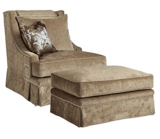 Ashton Ottoman shown with:Semi-attached boxed seat cushionDeep skirtSilver nailhead frame trim
