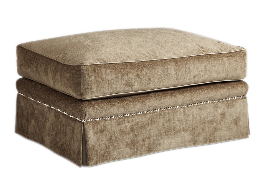 Ashton Ottoman shown with:Semi-attached boxed seat cushionDeep skirtSilver nailhead frame trim