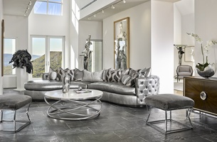 Aurora&nbsp;2-Piece Sofa shown with:Boxed bench seatSilver button tufted inside and outside backBuilt-to-the-floor with wood plinth in Bombay finish