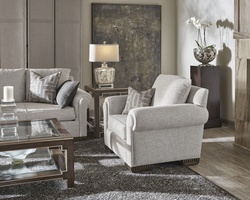 Bentley Chair shown with:Boxed&nbsp;cushionBuilt-to-the-floor with wood legs in&nbsp;Pumice finish