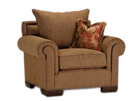 Bentley Chair shown with: Boxed&nbsp;cushionBuilt-to-the-floor with wood legs in Old World Briar&nbsp;finishAntique Brass nailhead frame trim