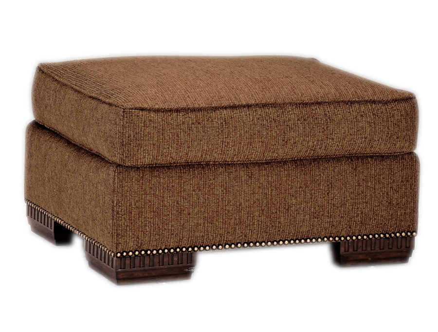 Bentley Ottoman&nbsp;shown with:Semi-attached boxed&nbsp;cushion with self pencil weltBuilt-to-the-floor with wood legs in Old World Briar&nbsp;finishAntique Brass nailhead frame trim