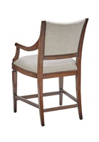 Cadence Counter Stool shown with:Cadence finishAntique Brass footrestMottled nailhead frame trim
