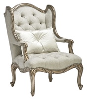 Coco Chair&nbsp;shown with:Tufted&nbsp;seat with Silver Star buttonsBronzed Silver finishVerona Silver Leaf finish trimSilver Star nailhead trim
