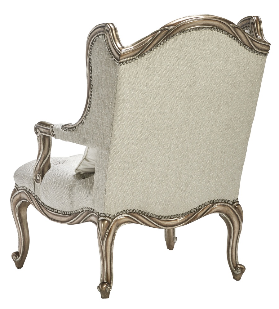 Coco Chair&nbsp;shown with:Tufted&nbsp;seat with Silver Star buttonsBronzed Silver finishVerona Silver Leaf finish trimSilver Star nailhead trim