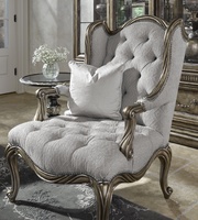 Coco Chair&nbsp;shown with:Tufted&nbsp;seat with Silver Star buttonsBronzed Silver finishVerona Silver Leaf finish trimSilver Star nailhead trim