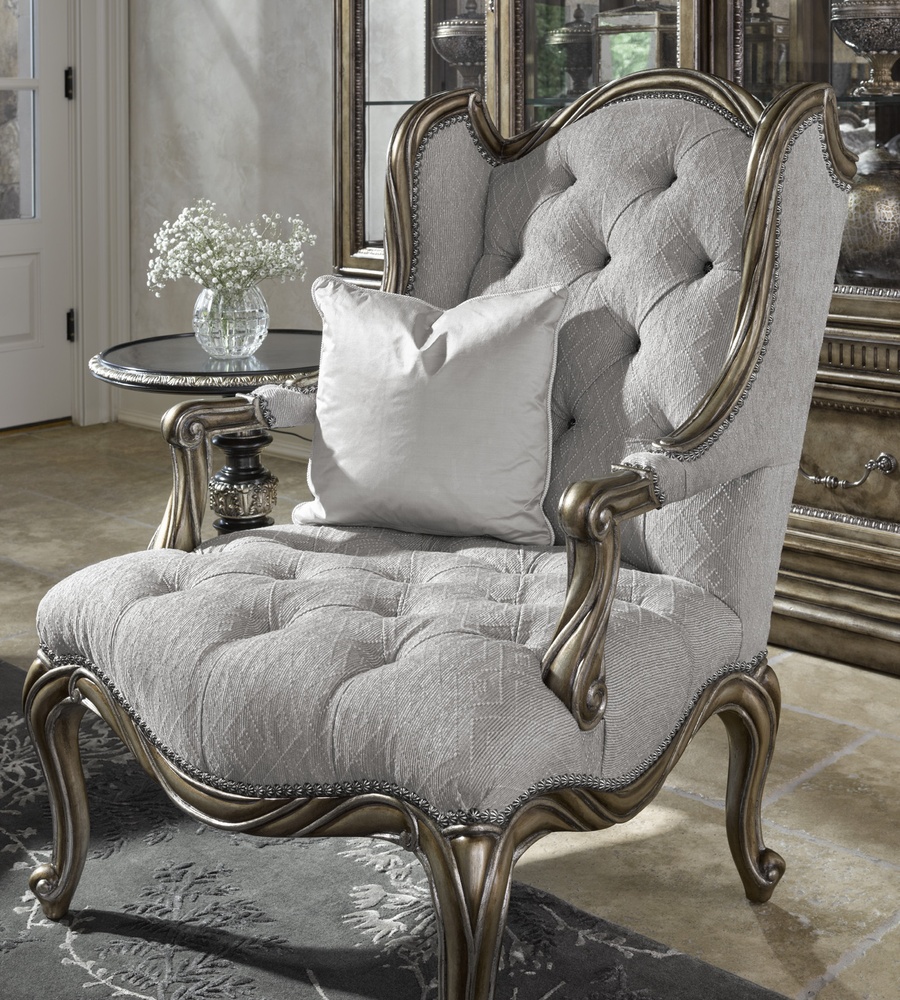 Coco Chair&nbsp;shown with:Tufted&nbsp;seat with Silver Star buttonsBronzed Silver finishVerona Silver Leaf finish trimSilver Star nailhead trim