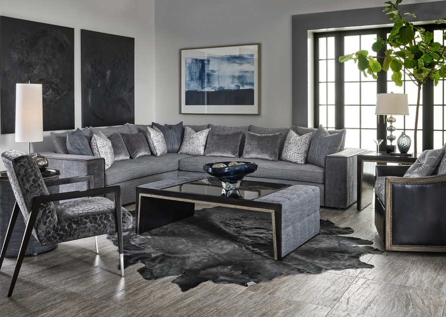 Cascade Cocktail Table shown with:Latte finish with Burnished Silver finish trimChanneled upholstery