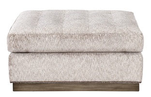 Coronado Ottoman shown with:Semi-Attached seat with Box QuiltingPlinth base&nbsp;in&nbsp;Latte&nbsp;finishMottled&nbsp;nailhead frame trim32" x 40"