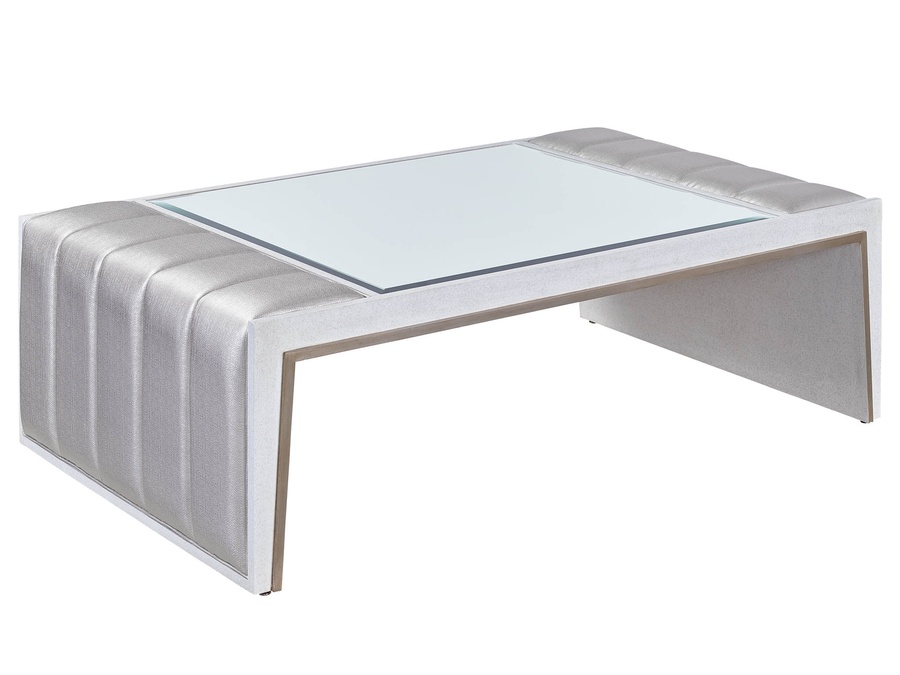 Cascade Cocktail Table shown with:Latte finish with Burnished Silver finish trimChanneled upholstery