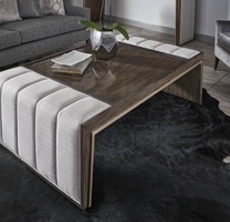 Cascade Cocktail Table shown with:Latte finish with Burnished Silver finish trimChanneled upholstery