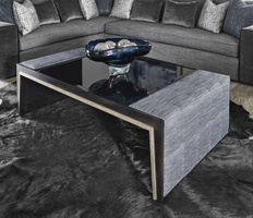 Cascade&nbsp;Cocktail Table shown with:Ebony&nbsp;finish with&nbsp;Aged Silver finish trimClear Mirror topBox Quilted&nbsp;upholstery