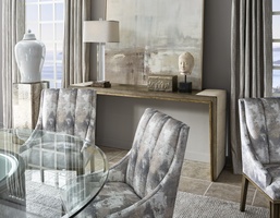 Cascade Console shown with:Slate&nbsp;finish with Aged Silver&nbsp;finish trimAged Silver&nbsp;inside leg finishBox Quilted&nbsp;upholstery