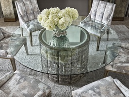Cascade Dining Table shown with:Slate&nbsp;finish with Aged&nbsp;Silver finish trimChanneled&nbsp;upholstery72" Diameter glass top