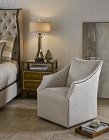 Dahlia Chair&nbsp;shown with:Tight&nbsp;seatBuilt-to-the-floor base with swivel optionSmall Antique Heritage nailhead trim