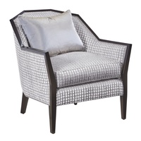 DaVinci Chair&nbsp;shown with:Boxed&nbsp;cushion seatBombay finishMerengue&nbsp;nailhead frame trim