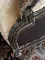 Emperador Lounge&nbsp;Chair&nbsp;shown with:Boxed seat cushionSumatra finishAged Gold Leaf finish trimNailhead frame trim