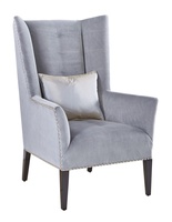 Emerson&nbsp;Chair&nbsp;shown with:Tight box quilted seat, arms, and inside backBombay&nbsp;finishSilver&nbsp;nailhead trim spaced over fabric tape