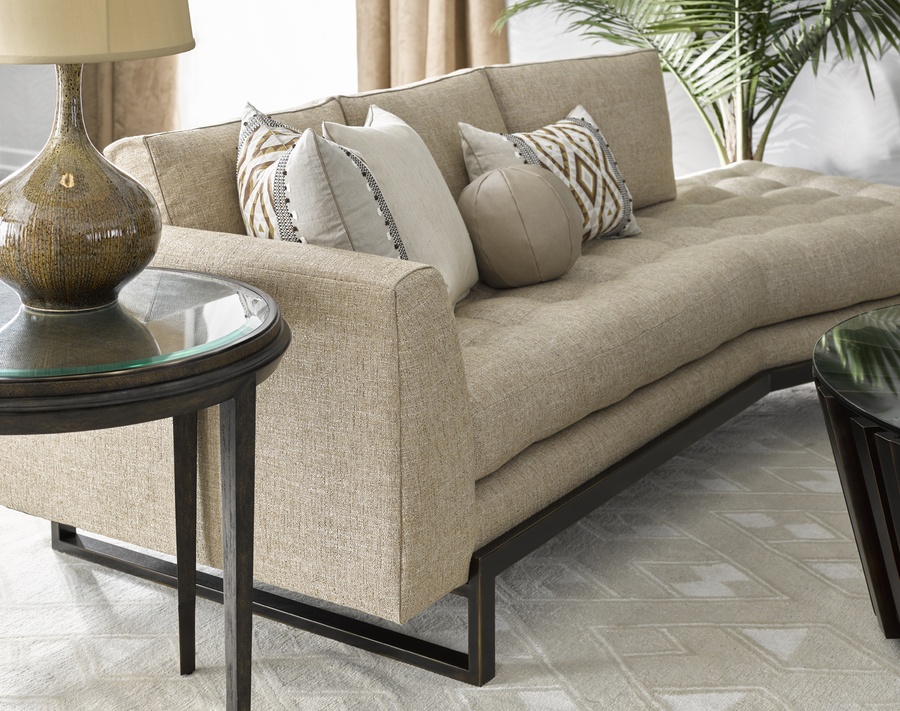 Flynn Sofa shown with: Boxed bench seat with quilted button detailBuilt-to-the-floor with metal base in Bronzed Brass finish