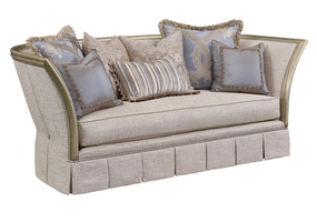 Iris Sofa shown with:Boxed bench seatBox pleated deep&nbsp;skirt with dressmaker back and sideswith decorative buttonsDeco Silver&nbsp;finishBurnished Silver&nbsp;Leaf finish trimPewter&nbsp;nailhead frame trim