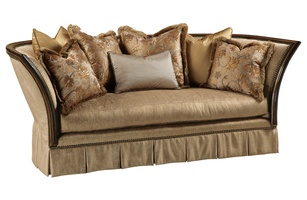Iris Sofa shown with: Boxed bench seat Box pleated deep&nbsp;skirt with dressmaker back and sideswith decorative buttonsOld World Sumatra finishAged Gold Leaf finish trimAntique Brass nailhead frame trim