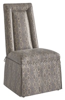 Justina Side Chair shown with:Tight seat and backDeep skirt with split back and button detailContrast underskirtAstoria nailhead trim around seatCastersAccessory tassel ties