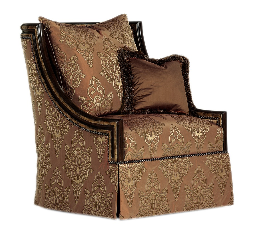Kenzie Chair&nbsp;shown with:Boxed seat cushionDeep skirt with built-in sides and back with button detailBronze Star nailhead frame trim
Exposed frame available in selection of finishes and trims