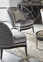 Leilani Chair shown with:Boxed bench seatRiviera&nbsp;finish&nbsp;on Exposed Wood Legs baseGlitterati nailhead frame trim