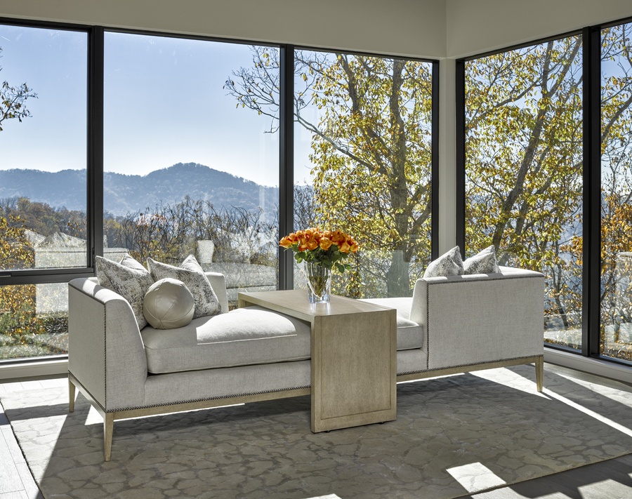 Libra Chaise shown with: Boxed bench seatBuilt-to-the-floor base with exposed wood legsin Dapple&nbsp;finishPewter nailhead frame trim