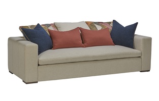 Lynx Sofa shown with:Built-to-the-floor base with wood legs in Saddle finish
