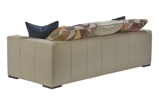 Lynx Sofa shown with:Built-to-the-floor base with wood legs in Saddle finish