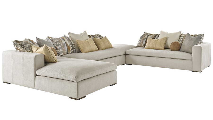 Lynx Sectional shown with:LNX44, LNX53, LNX62Boxed bench seatBuilt-to-the-floor base with wood legs in Saddle finish