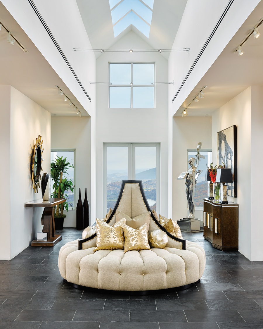 Mirage Round&nbsp;Sofa shown with: Button tufted seatBuilt-to-the-floor with plinth base in Sumatra finishMerengue nailhead frame trim