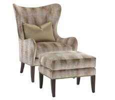 Nelson Ottoman&nbsp;shown with:Semi-attached boxed seat cushionHavana&nbsp;finishSamurai&nbsp;nailhead frame trim
