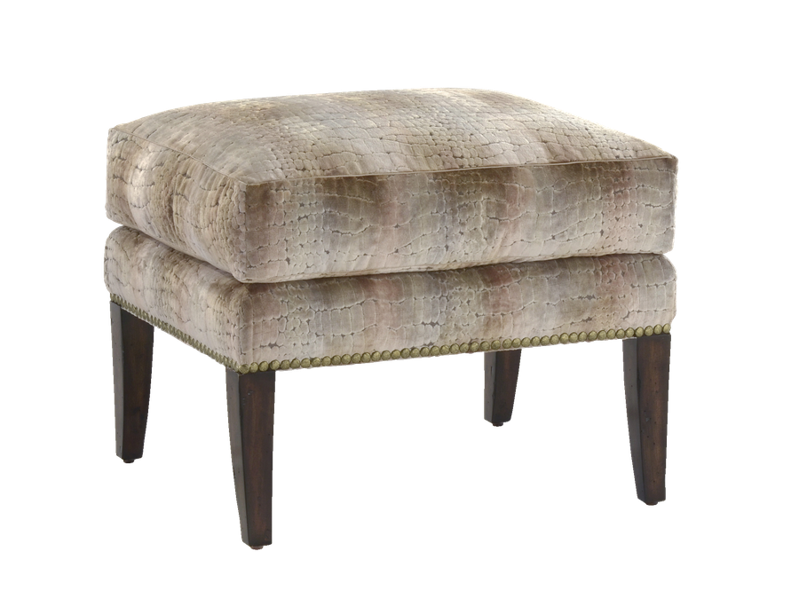 Nelson Ottoman&nbsp;shown with:Semi-attached boxed seat cushionHavana&nbsp;finishSamurai&nbsp;nailhead frame trim