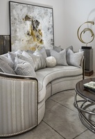 Odessa Sofa shown with:Boxed benchBuilt-to-the-floor baseBombay finish with Silver Cloud trimMerengue nailhead frame trim
