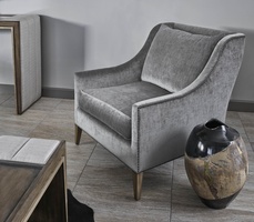 Olinda Chair shown with:Latte finishGunmetal nailhead frame trim