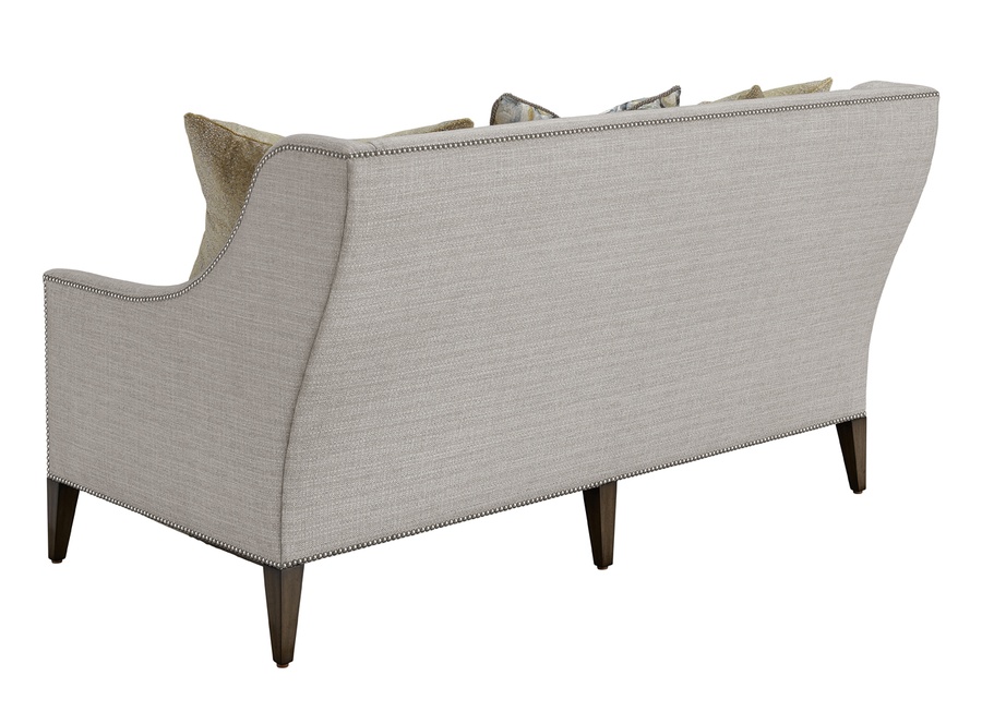 Olinda Love Seat shown with:Built-to-the-Floor with Exposed Wood Legs in Pumice finishPewter nailhead frame trim